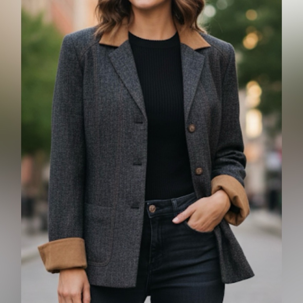 Women's Black and Brown Jacket It has two small holes in the back.